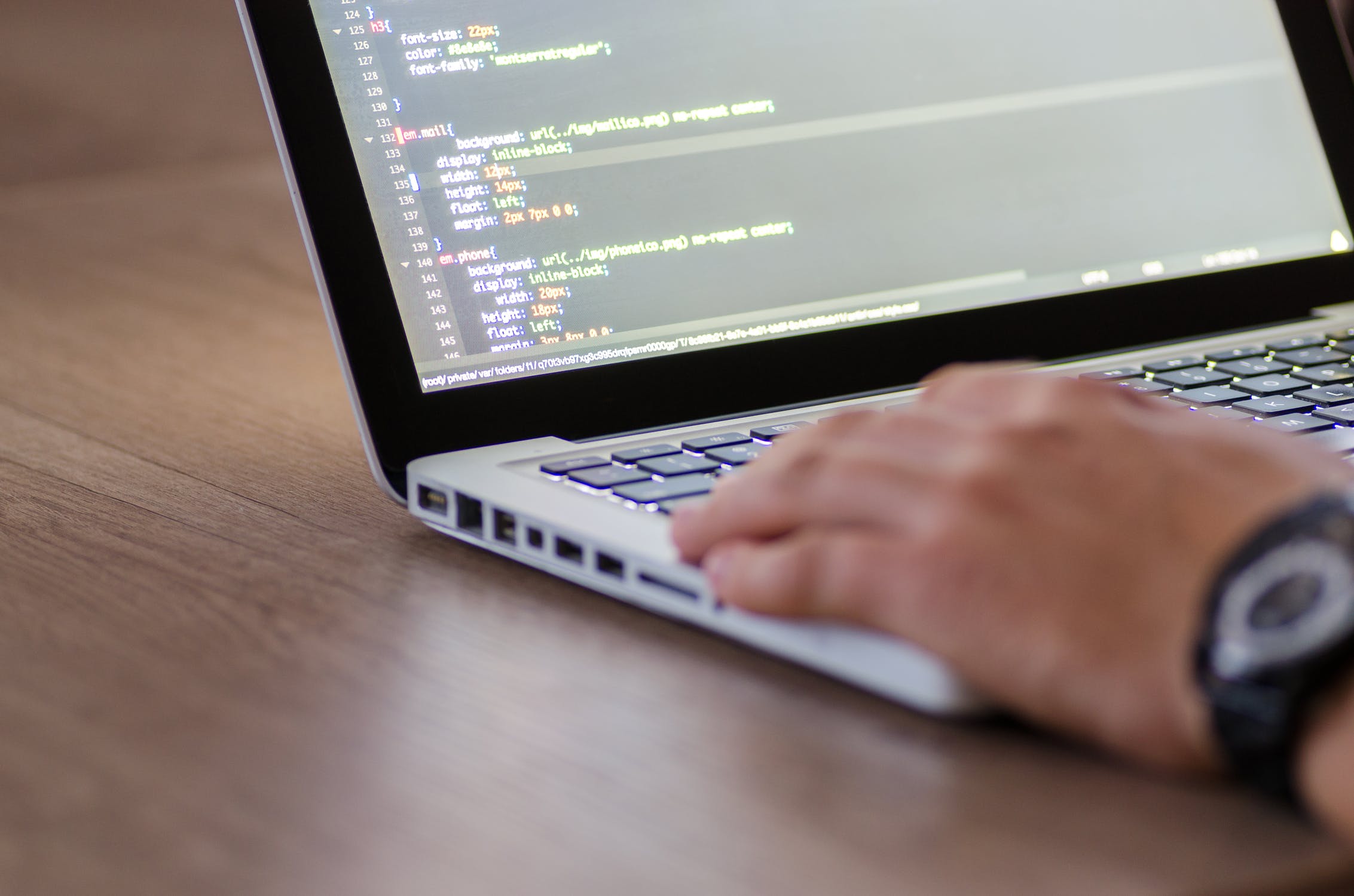 coding on the laptop, php development