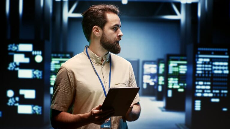 Image of IT professional managing data and service continuity in a server room