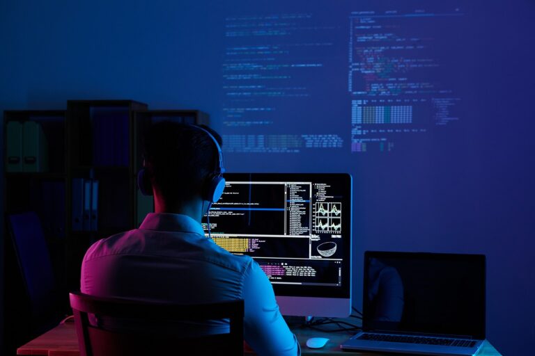 Image of Man at work on code of single-page application
