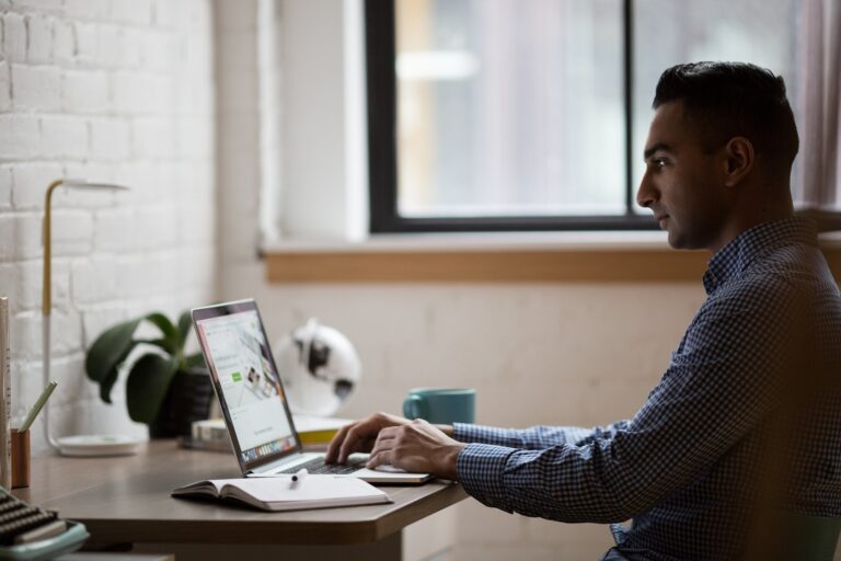 Image of A man operating with offshore mobile application development
